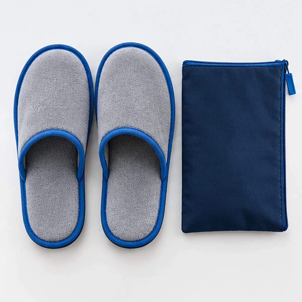 Fold-Flat Travel Slipper Pair — package contents